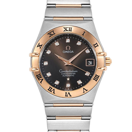 Luxury watch with silver and rose gold band on a white background