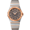 Luxury watch with rose gold and silver band on a white background