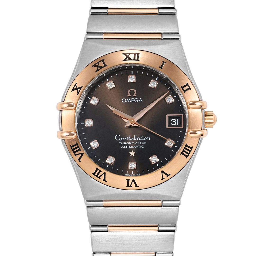 Luxury watch with silver and rose gold band on a white background